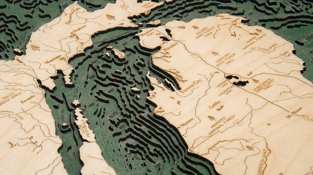 Close-up of the stacked birch depth layers on a Great Lakes 3D wood map