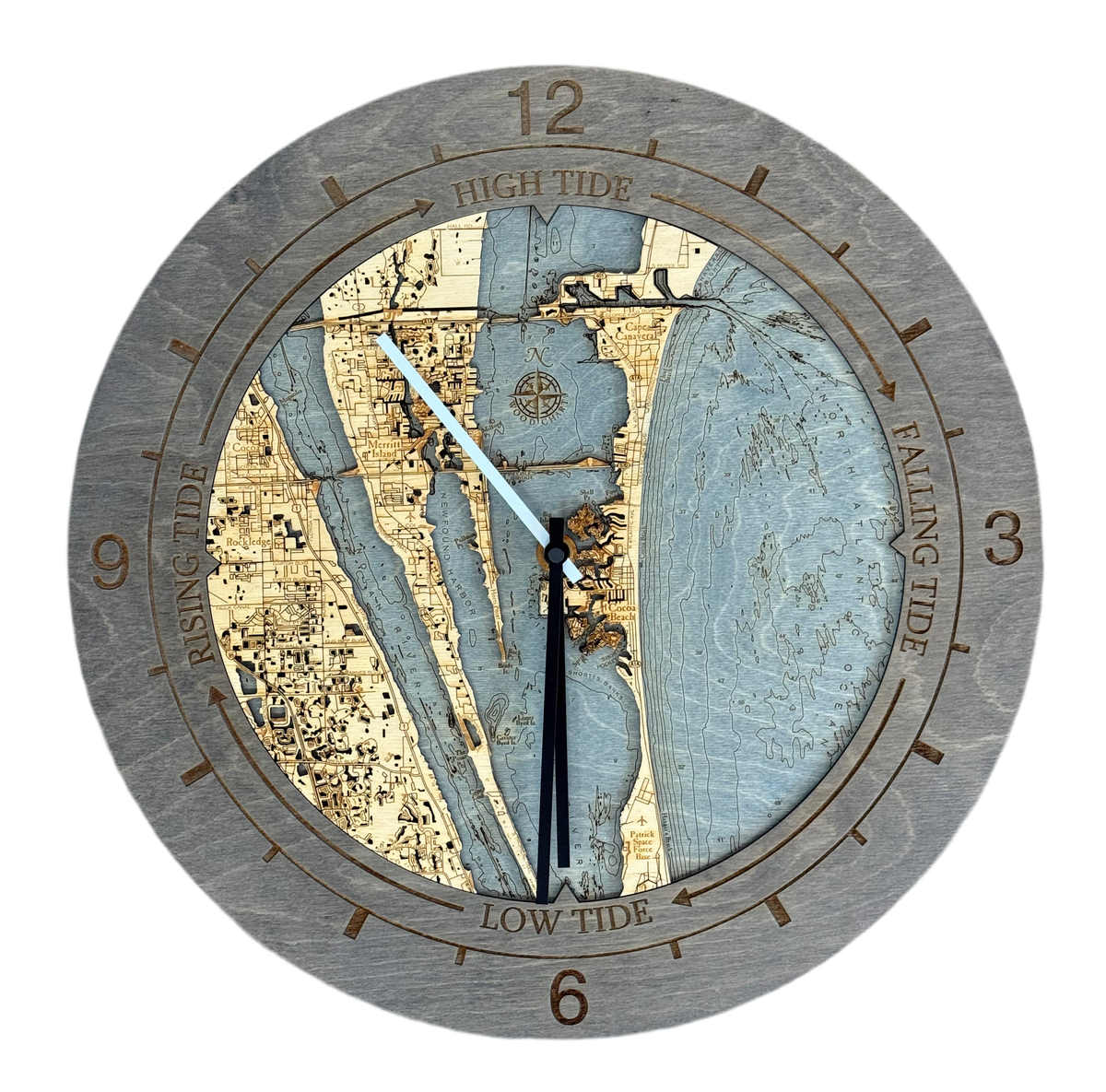 Cocoa Beach, Florida wood tide clock in laser-cut Baltic birch, shown framed against a light wall