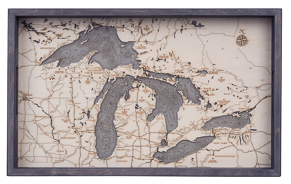 Great Lakes wood serving tray in laser-cut Baltic birch, shown framed against a light wall