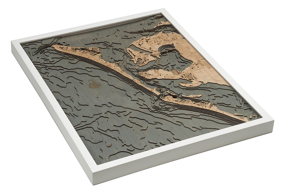 Anna Maria Island, Florida 3D layered wood map in laser-cut Baltic birch, shown framed against a light wall