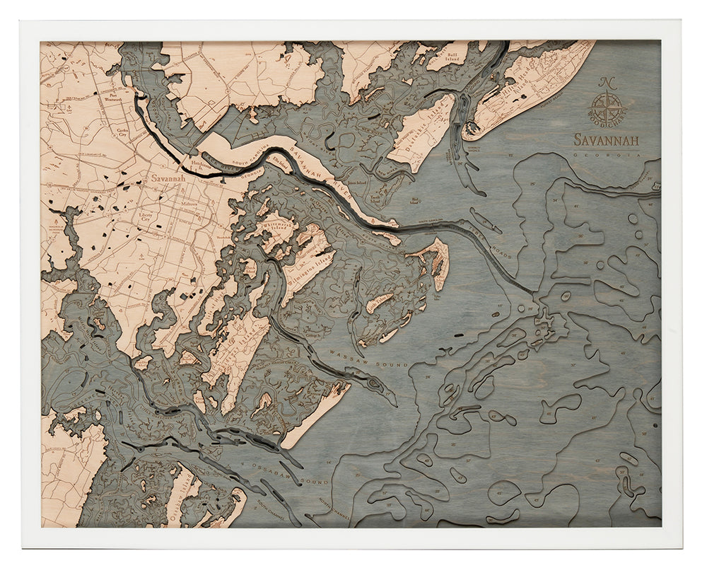 Savannah, Georgia 3D layered wood map in laser-cut Baltic birch, shown framed against a light wall