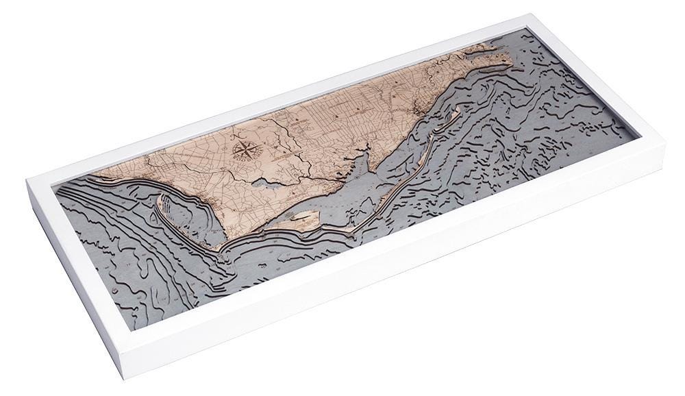 Mexico Beach to Bald Point, Florida 3D layered wood map in laser-cut Baltic birch, shown framed against a light wall