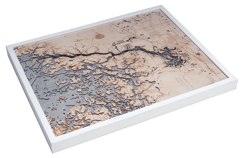 Crystal River, Florida 3D layered wood map in laser-cut Baltic birch, shown framed against a light wall