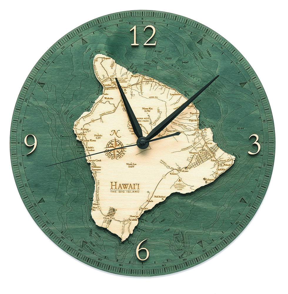 The Big Island, Hawaii wood wall clock in laser-cut Baltic birch, shown framed against a light wall