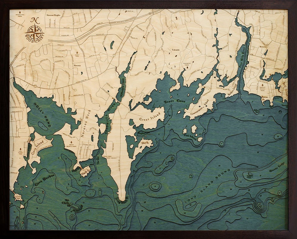 Darien, Connecticut 3D layered wood map in laser-cut Baltic birch, shown framed against a light wall