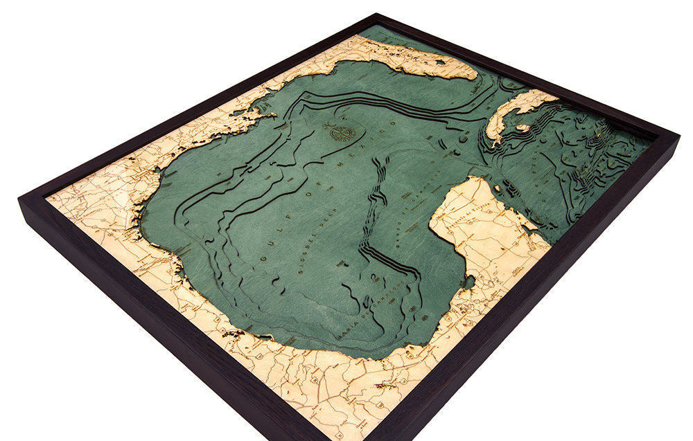 Gulf Of Mexico 3D layered wood map in laser-cut Baltic birch, shown framed against a light wall