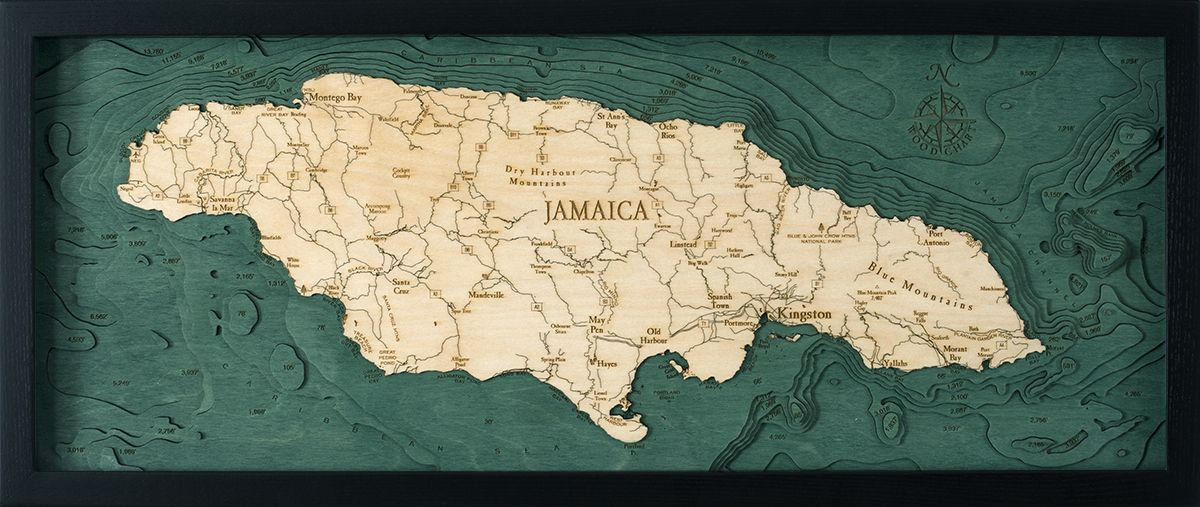 Jamaica, Caribbean 3D layered wood map in laser-cut Baltic birch, shown framed against a light wall