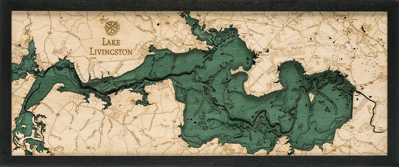 Lake Livingston, Texas 3D layered wood map in laser-cut Baltic birch, shown framed against a light wall