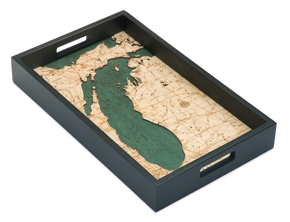 Lake Michigan wood serving tray in laser-cut Baltic birch, shown framed against a light wall