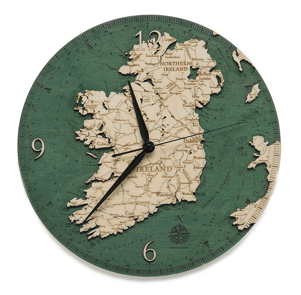 Ireland wood wall clock in laser-cut Baltic birch, shown framed against a light wall