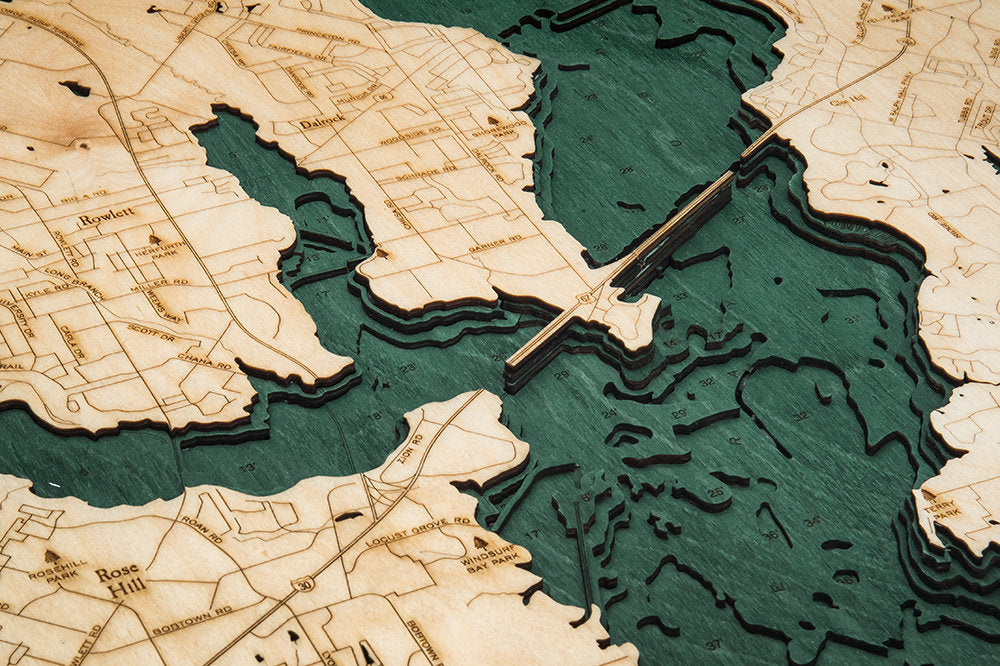 Lake Ray Hubbard, Texas 3D layered wood map in laser-cut Baltic birch, shown framed against a light wall