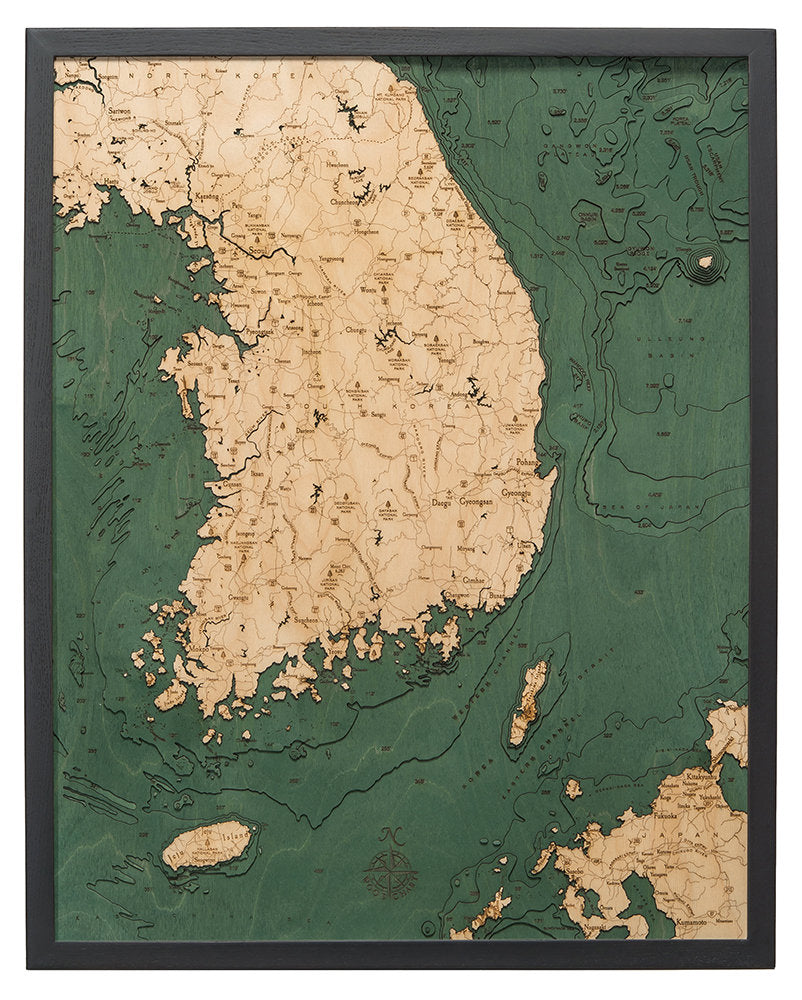 South Korea 3D layered wood map in laser-cut Baltic birch, shown framed against a light wall