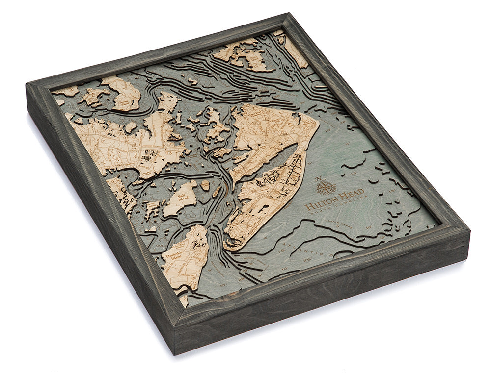 Hilton Head, South Carolina 3D layered wood map in laser-cut Baltic birch, shown framed against a light wall