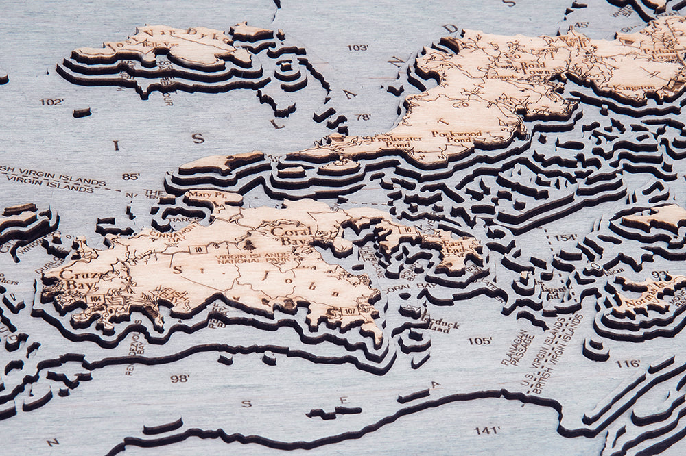 Virgin Islands, Caribbean 3D layered wood map in laser-cut Baltic birch, shown framed against a light wall
