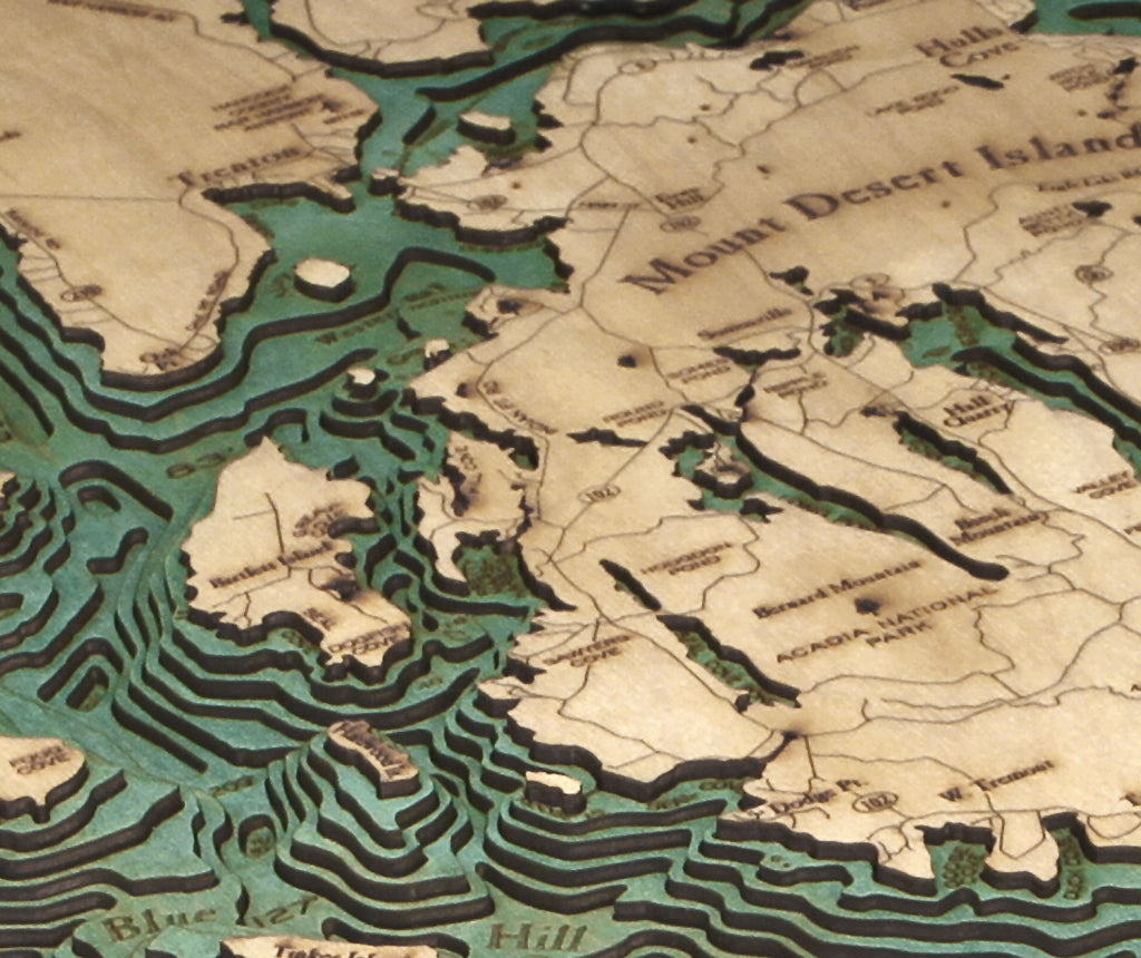 Bar Harbor & Mount Desert, Maine 3D layered wood map in laser-cut Baltic birch, shown framed against a light wall