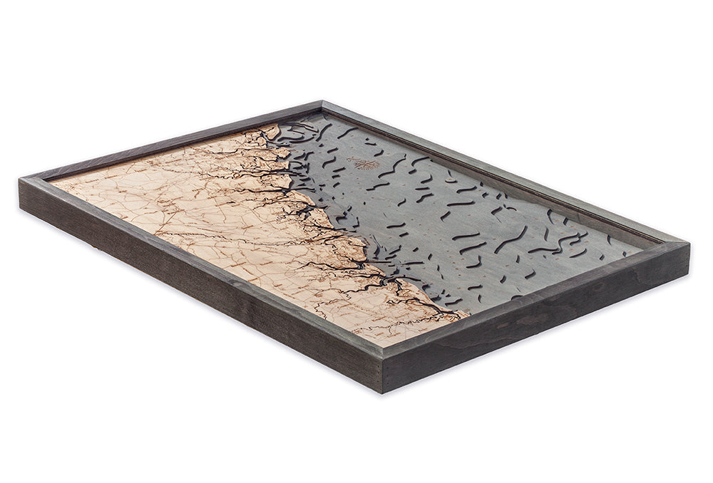 Georgia Coast 3D layered wood map in laser-cut Baltic birch, shown framed against a light wall
