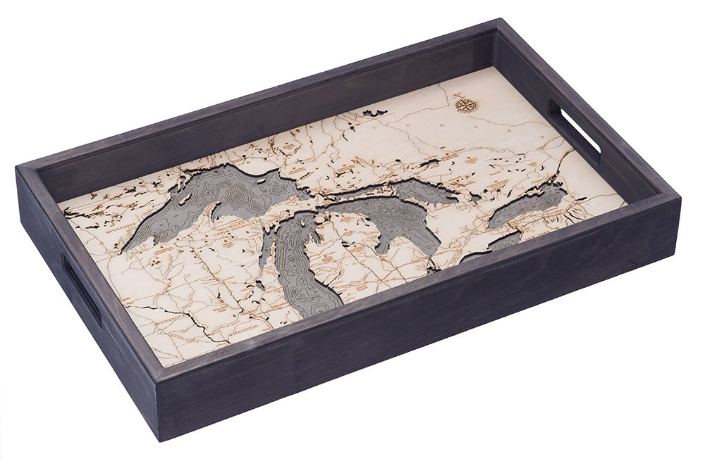 Great Lakes wood serving tray in laser-cut Baltic birch, shown framed against a light wall