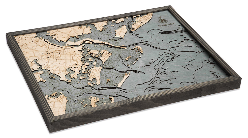 Savannah, Georgia 3D layered wood map in laser-cut Baltic birch, shown framed against a light wall