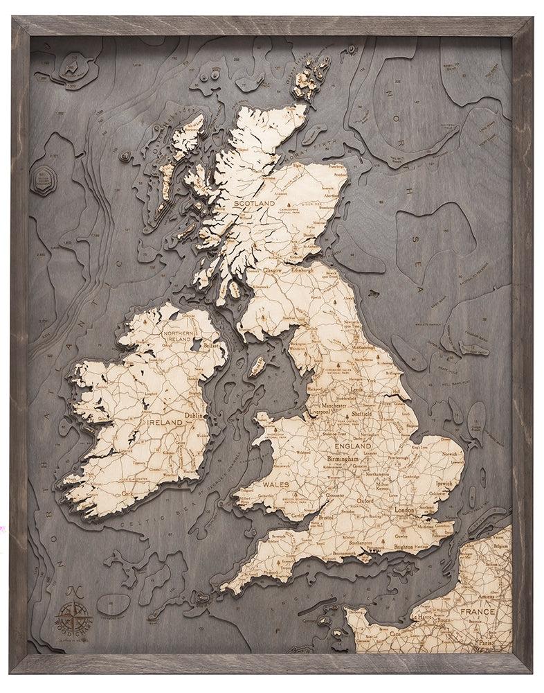 United Kingdom 3D layered wood map in laser-cut Baltic birch, shown framed against a light wall
