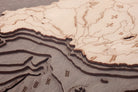 Catalina Island, California 3D layered wood map in laser-cut Baltic birch, shown framed against a light wall