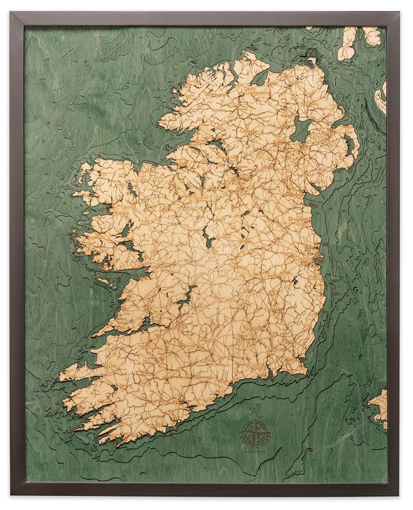 Ireland 3D layered wood map in laser-cut Baltic birch, shown framed against a light wall