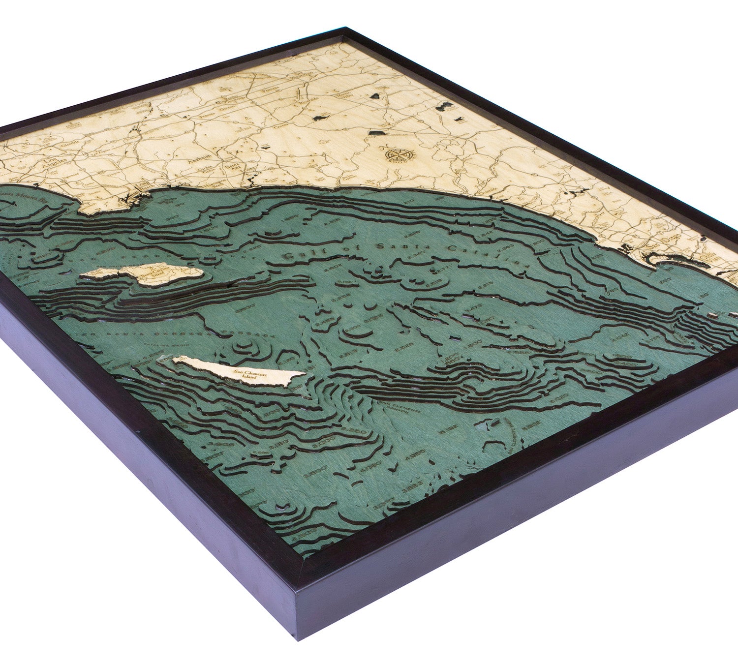 LA to San Diego, California 3D layered wood map in laser-cut Baltic birch, shown framed against a light wall