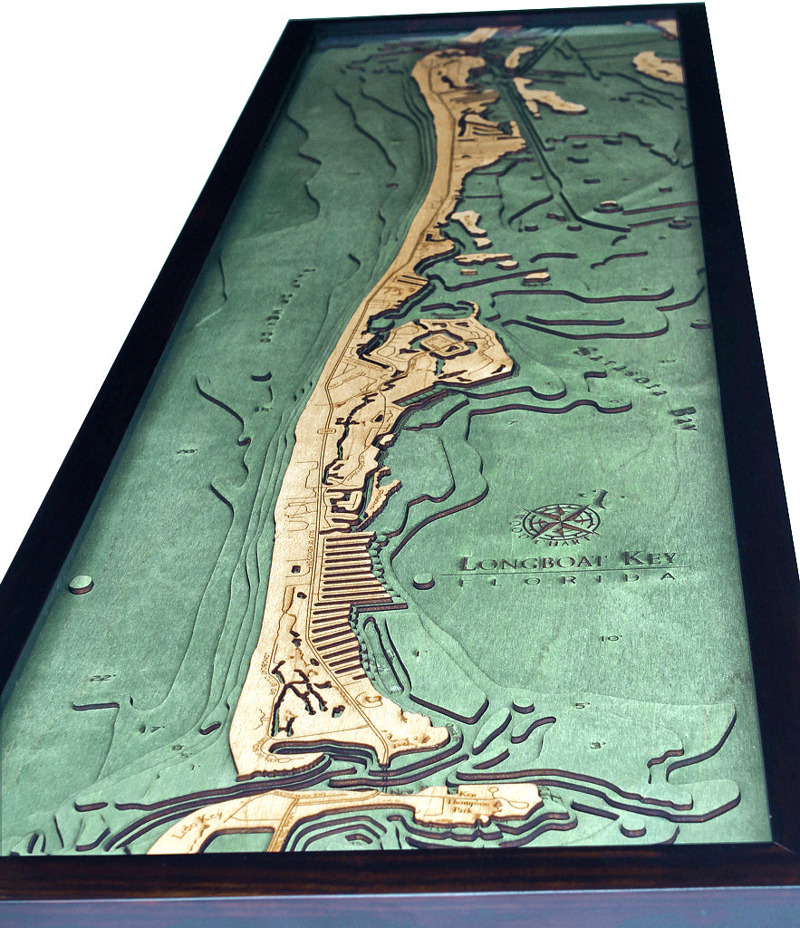 Longboat Key, Florida 3D layered wood map in laser-cut Baltic birch, shown framed against a light wall