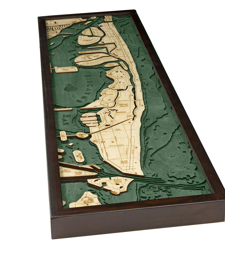 Miami Beach, Florida 3D layered wood map in laser-cut Baltic birch, shown framed against a light wall