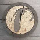 Lake Michigan wood wall clock in laser-cut Baltic birch, shown framed against a light wall