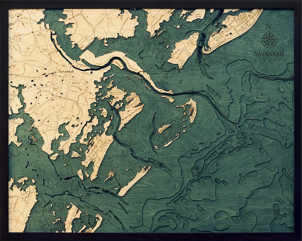 Savannah, Georgia 3D layered wood map in laser-cut Baltic birch, shown framed against a light wall