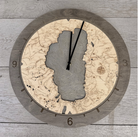 Lake Tahoe, California wood wall clock in laser-cut Baltic birch, shown framed against a light wall
