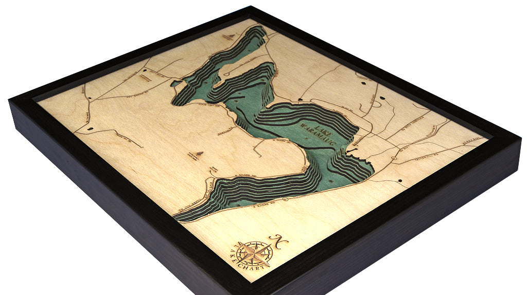 Lake Waramaug, Connecticut 3D layered wood map in laser-cut Baltic birch, shown framed against a light wall
