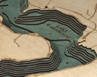 Lake Waramaug, Connecticut 3D layered wood map in laser-cut Baltic birch, shown framed against a light wall