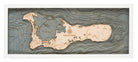 Grand Cayman, Caribbean 3D layered wood map in laser-cut Baltic birch, shown framed against a light wall