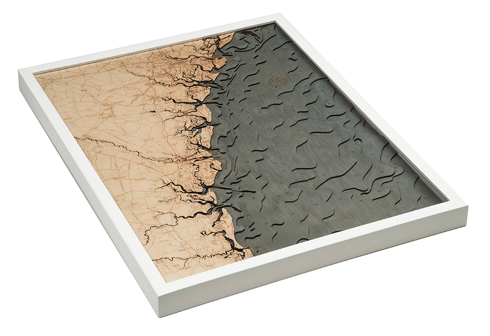 Georgia Coast 3D layered wood map in laser-cut Baltic birch, shown framed against a light wall