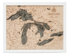 Great Lakes 3D layered wood map in laser-cut Baltic birch, shown framed against a light wall
