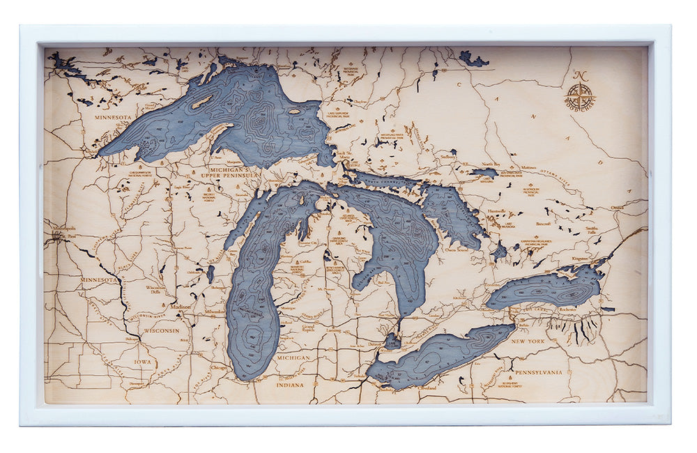 Great Lakes wood serving tray in laser-cut Baltic birch, shown framed against a light wall