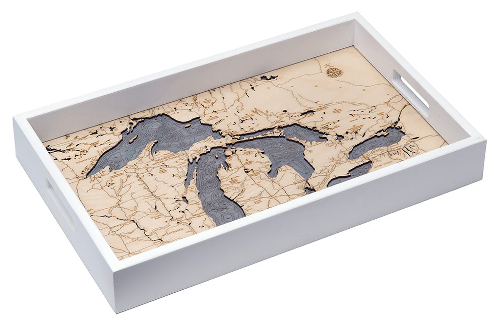 Great Lakes wood serving tray in laser-cut Baltic birch, shown framed against a light wall