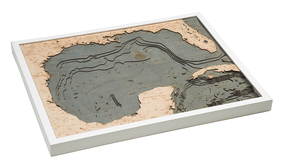 Gulf Of Mexico 3D layered wood map in laser-cut Baltic birch, shown framed against a light wall