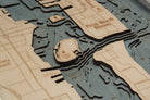 Palm Beach, Florida 3D layered wood map in laser-cut Baltic birch, shown framed against a light wall