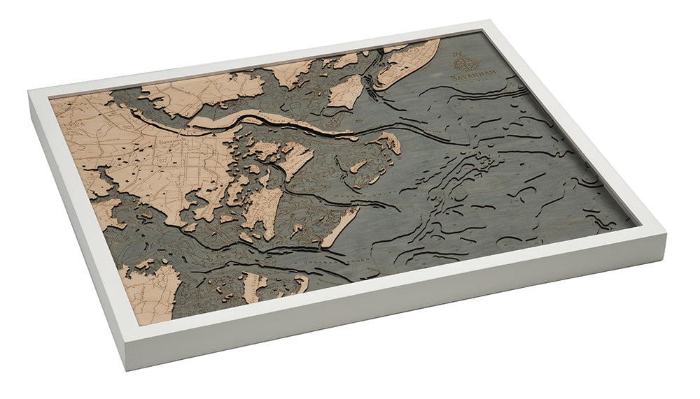 Savannah, Georgia 3D layered wood map in laser-cut Baltic birch, shown framed against a light wall