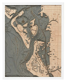 Siesta Key, Florida 3D layered wood map in laser-cut Baltic birch, shown framed against a light wall