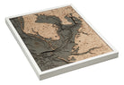 Tampa Bay, Florida 3D layered wood map in laser-cut Baltic birch, shown framed against a light wall