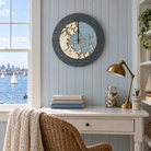 Boston Harbor, Massachusetts wood tide clock hanging on the wall in a cottage reading nook