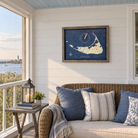 Nantucket, Massachusetts framed tide and time clock hanging on the wall on a screened porch
