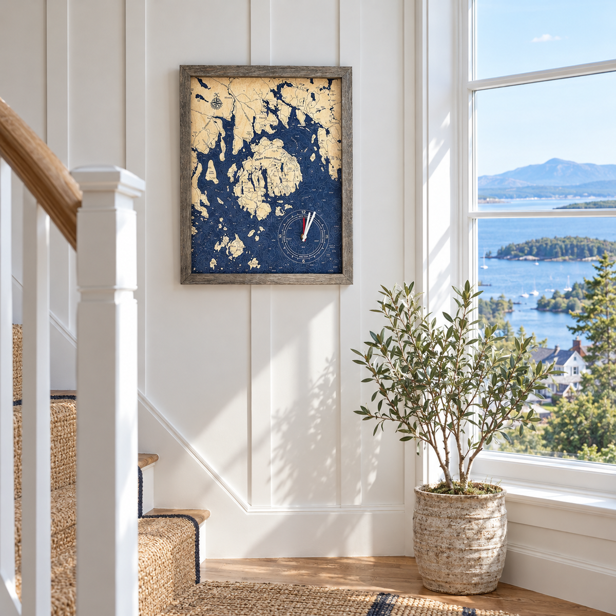 Bar Harbor and Mount Desert, Maine framed tide and time clock hanging on the wall on a stair landing