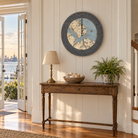 Norfolk, Virginia wood tide clock hanging on the wall in a bright entry hall