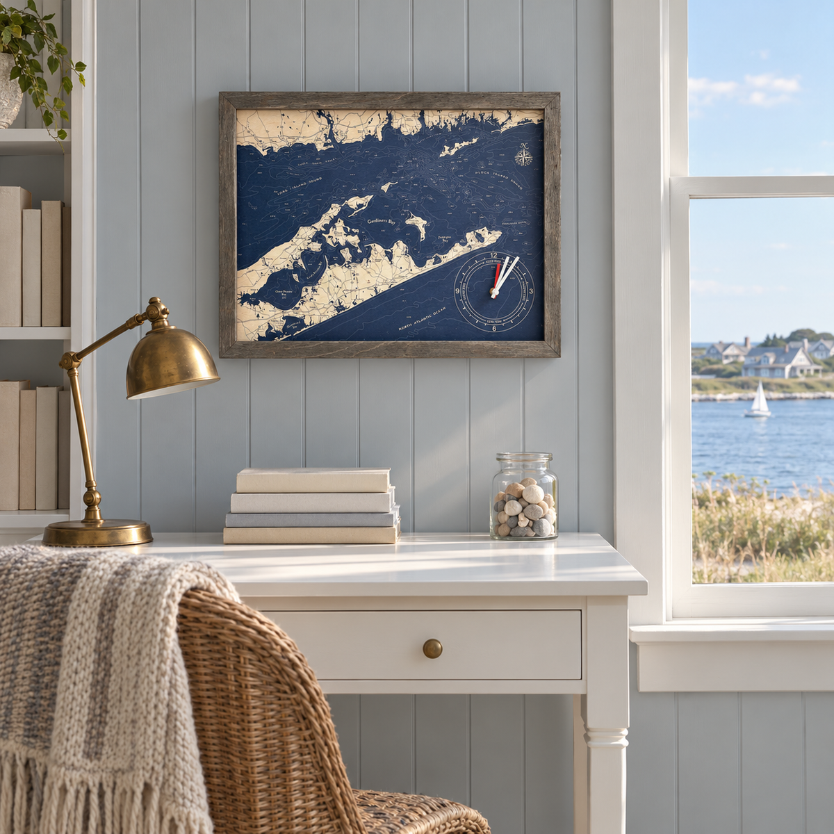 The Hamptons, New York framed tide and time clock hanging on the wall in a cottage reading nook