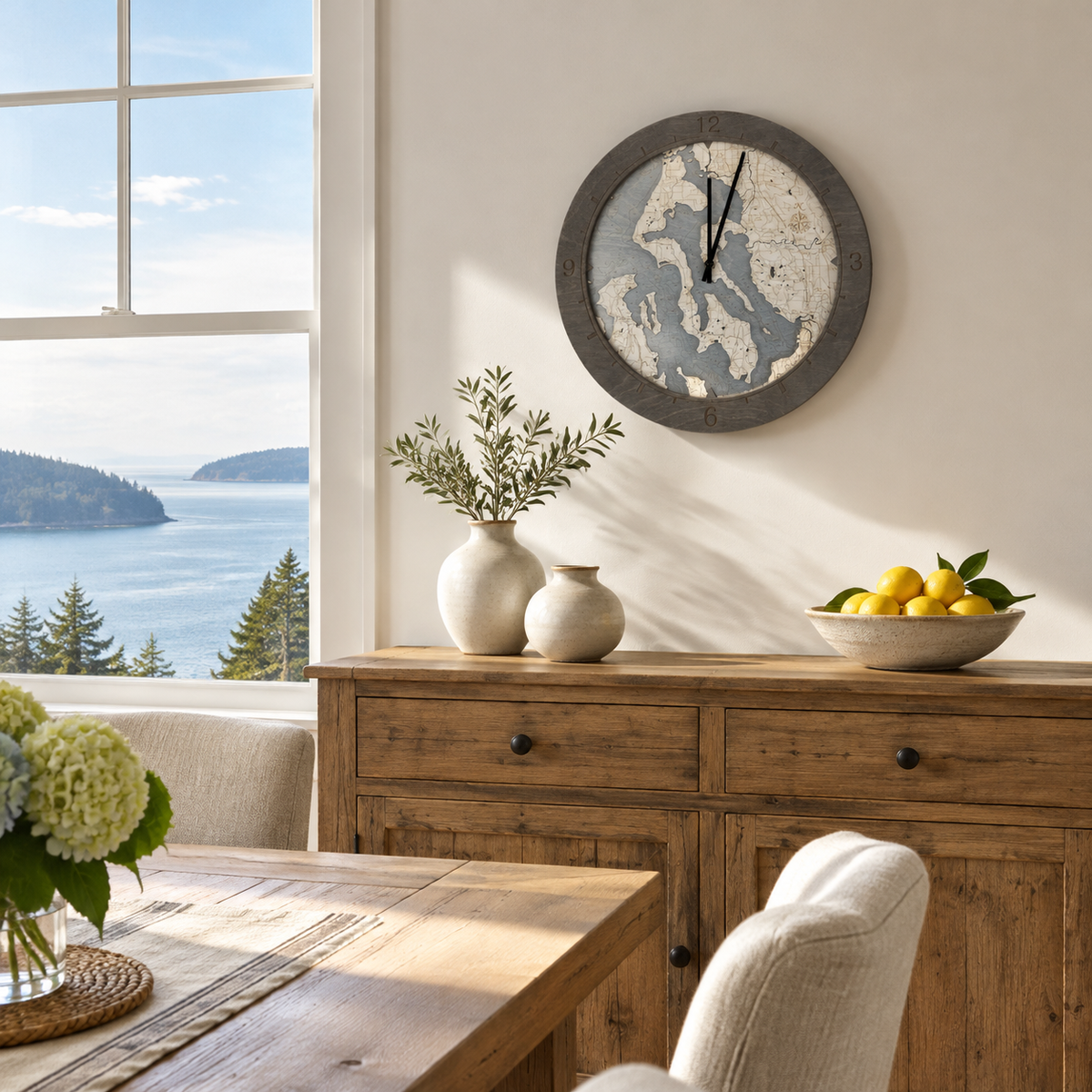 Whidbey and Camano Islands, Washington wood ring clock hanging on the wall in a coastal dining room