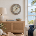 Islamorada, Florida tide and time clock hanging on the wall in a coastal living room